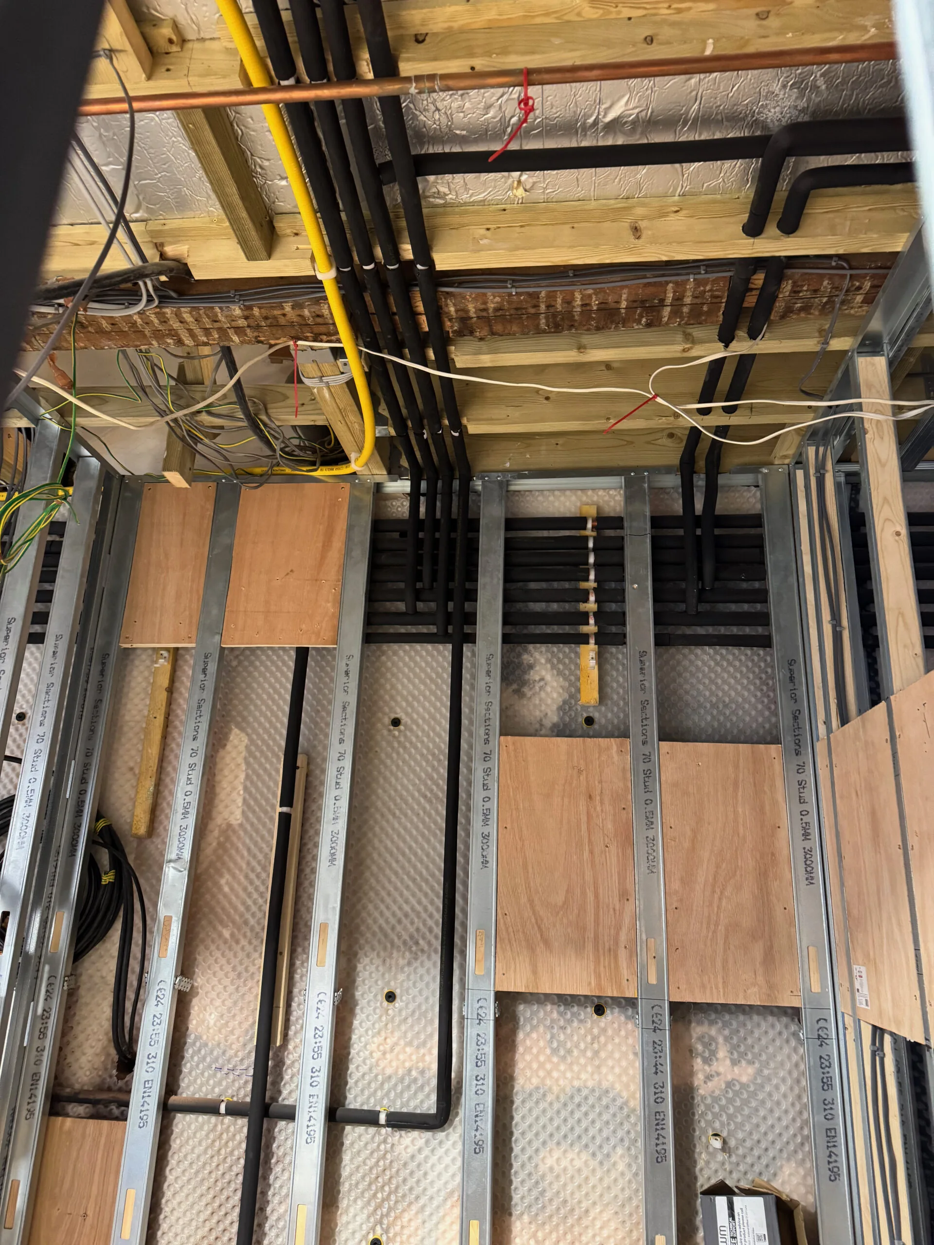 Pipework routed through the structure during installation