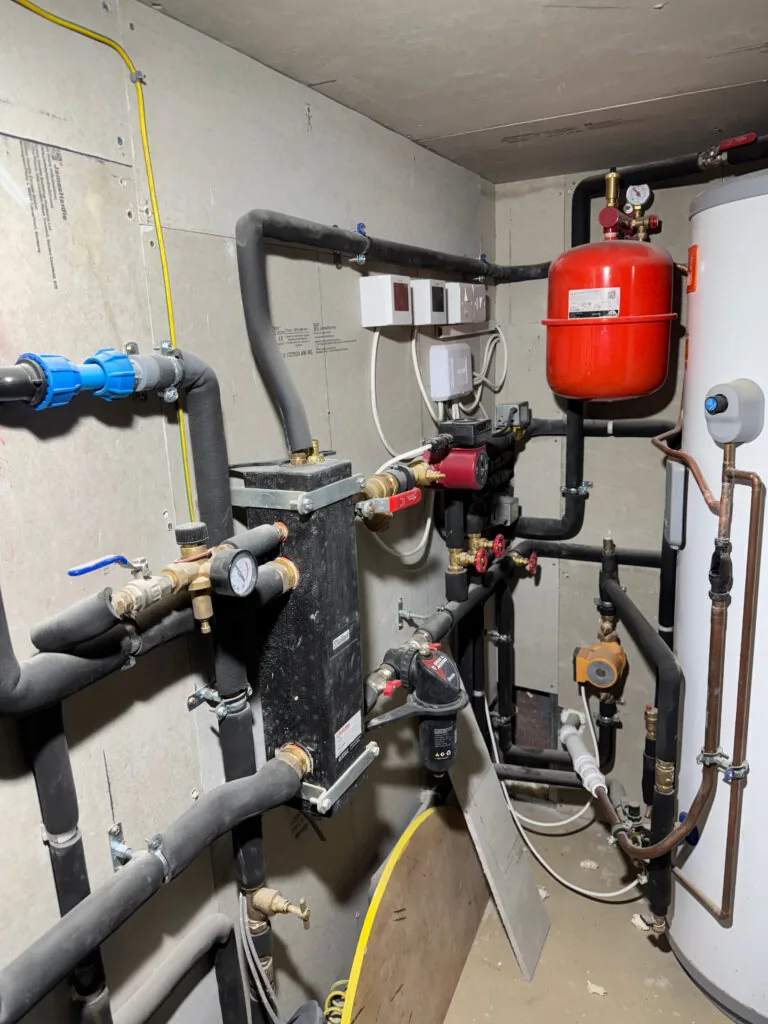 Heating pumps, valves, insulated pipework and hot water cylinder